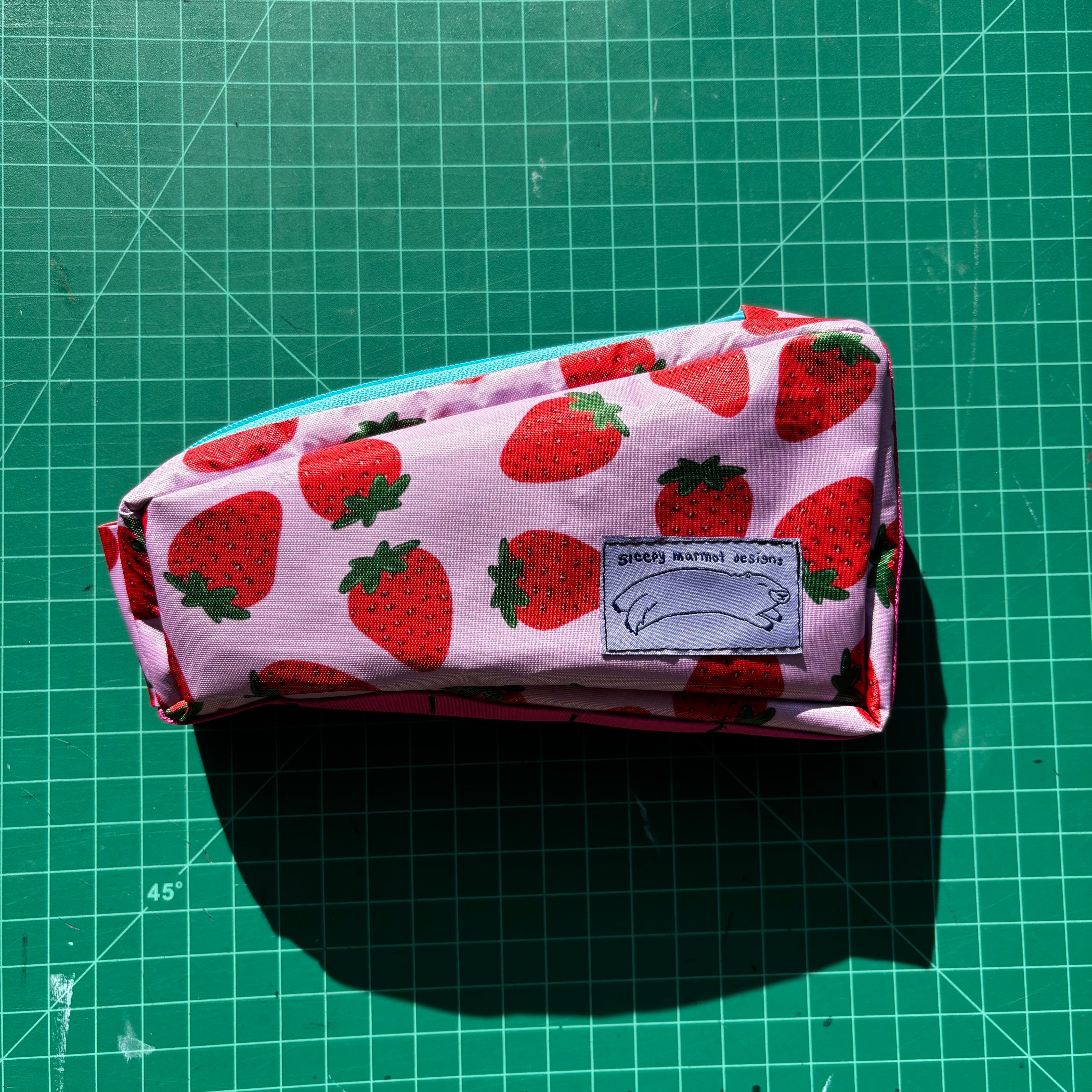 Top tube bag - Strawberry print w/ blue zipper & pink webbing