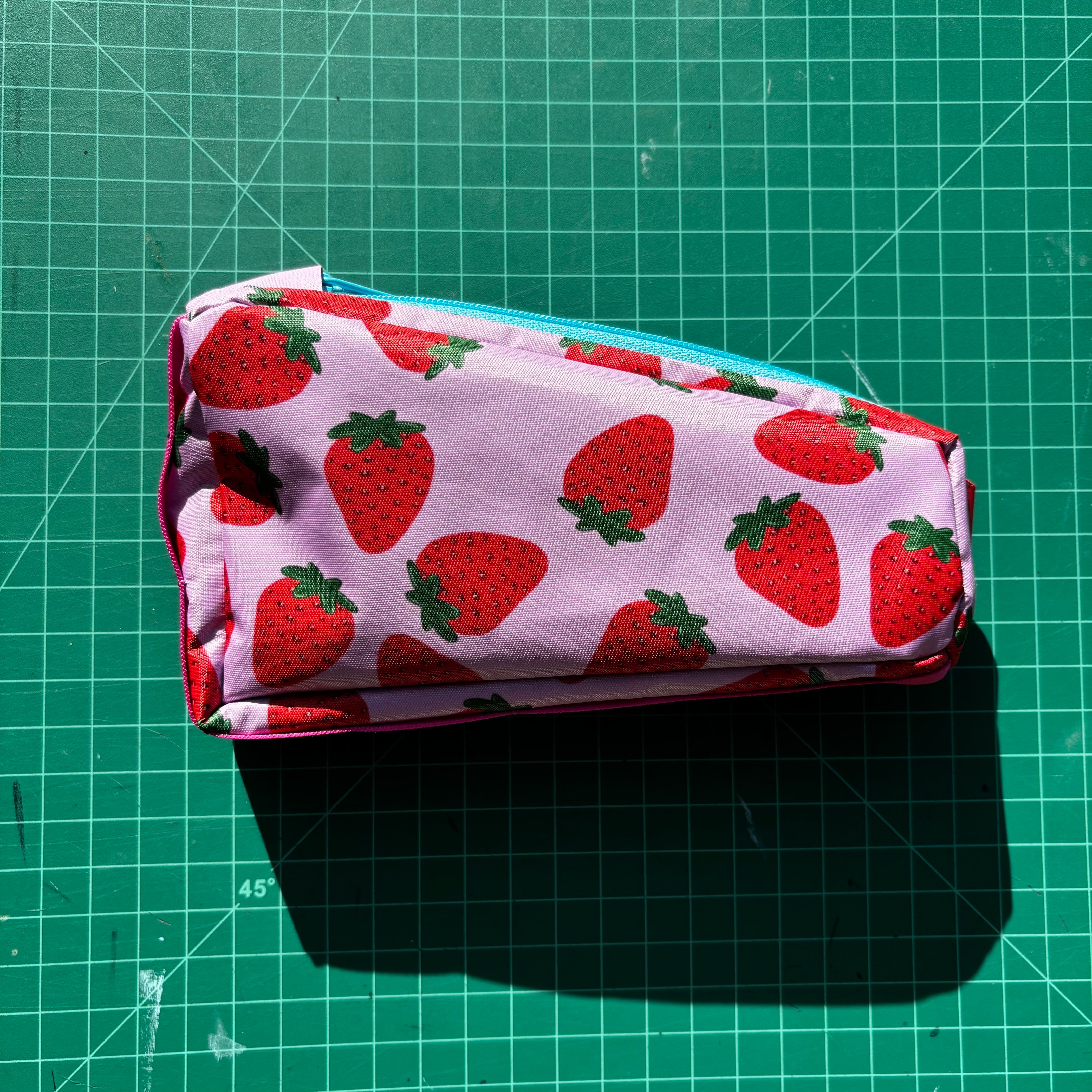 Top tube bag - Strawberry print w/ blue zipper & pink webbing