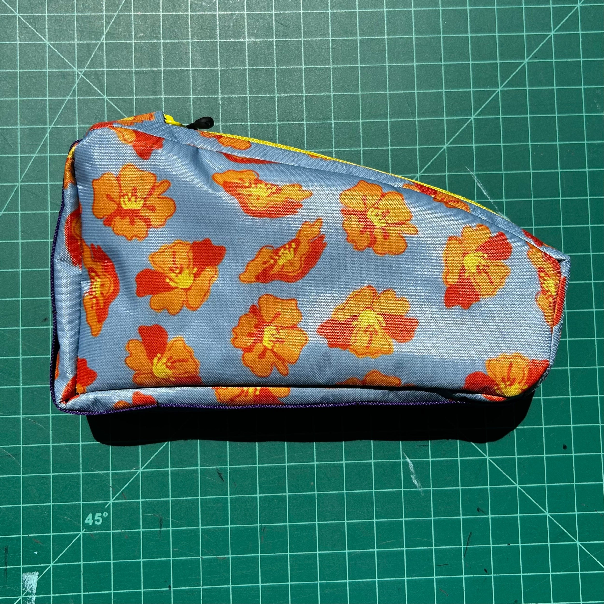 Top tube bag - Orange Flowers w/ yellow zipper and purple webbing