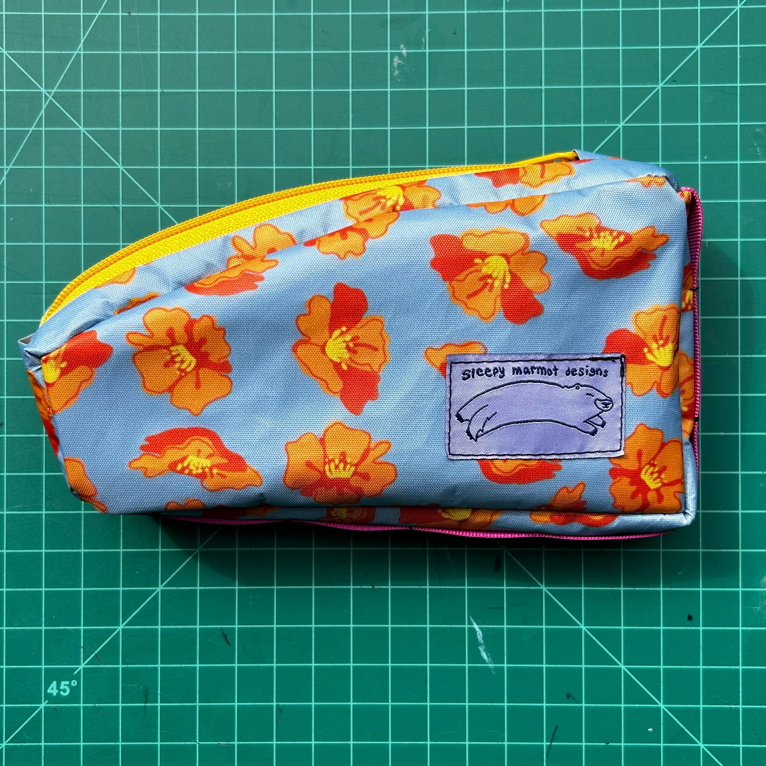 Top tube bag - Orange Flowers w/ yellow zipper & pink webbing
